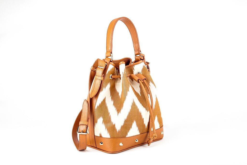 Primrose Sustainable Ikat Drawstring Bucket Bag with leather strap and trims - Beige - SJW BAGS LONDON